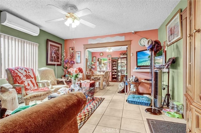 11847 Alabama St, Los Angeles, CA 90059 - living area with a wall mounted AC, ceiling fan, light tile patterned floors, and a textured ceiling