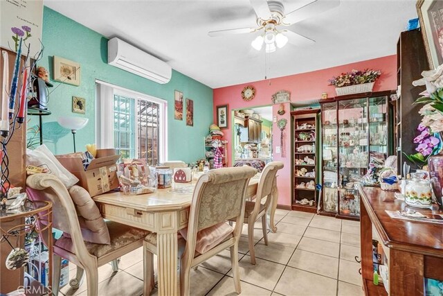 11847 Alabama St, Los Angeles, CA 90059 - dining room featuring a wall mounted air conditioner, ceiling fan, and light tile patterned flooring