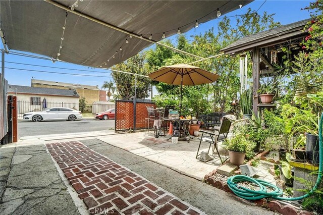 11847 Alabama St, Los Angeles, CA 90059 - view of patio / terrace with outdoor dining area