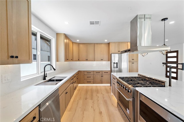 2405 Larchmont Ave, Santa Ana, CA 92706 - kitchen with appliances with stainless steel finishes, light brown cabinets, island range hood, plenty of natural light, and recessed lighting