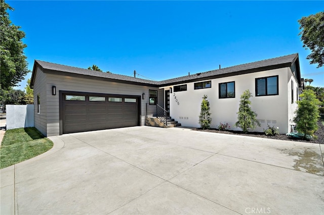 2405 Larchmont Ave, Santa Ana, CA 92706 - view of front of home with an attached garage and driveway