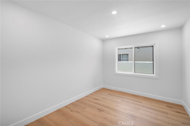 2405 Larchmont Ave, Santa Ana, CA 92706 - unfurnished room featuring light wood-style flooring and recessed lighting