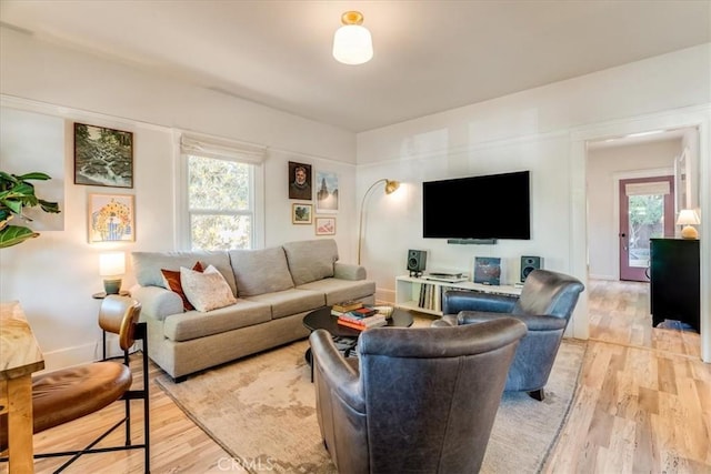 680 Howard St, San Luis Obispo, CA 93401 - living area with healthy amount of natural light and light wood-style flooring