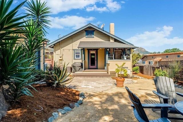 680 Howard St, San Luis Obispo, CA 93401 - bungalow-style home featuring covered porch and a chimney