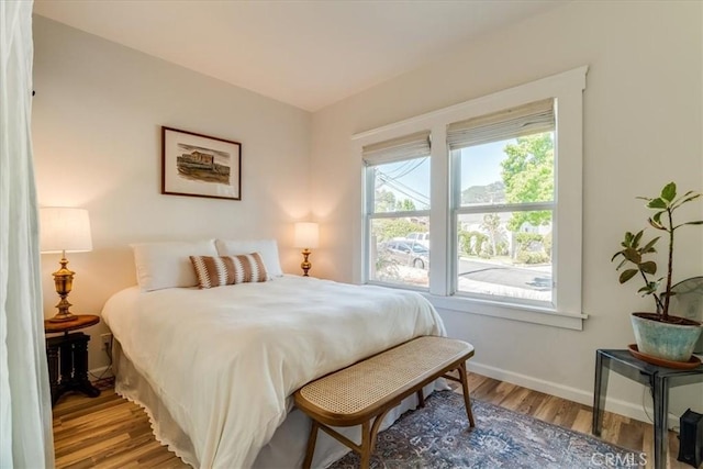 680 Howard St, San Luis Obispo, CA 93401 - bedroom featuring wood finished floors and baseboards