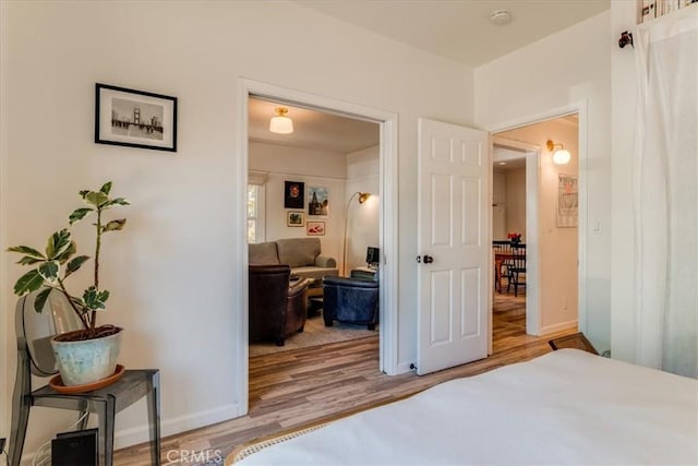 680 Howard St, San Luis Obispo, CA 93401 - bedroom with wood finished floors and baseboards