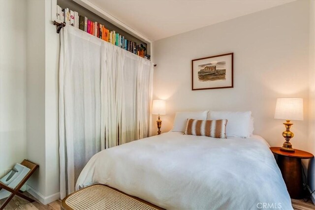 680 Howard St, San Luis Obispo, CA 93401 - bedroom with wood finished floors and baseboards