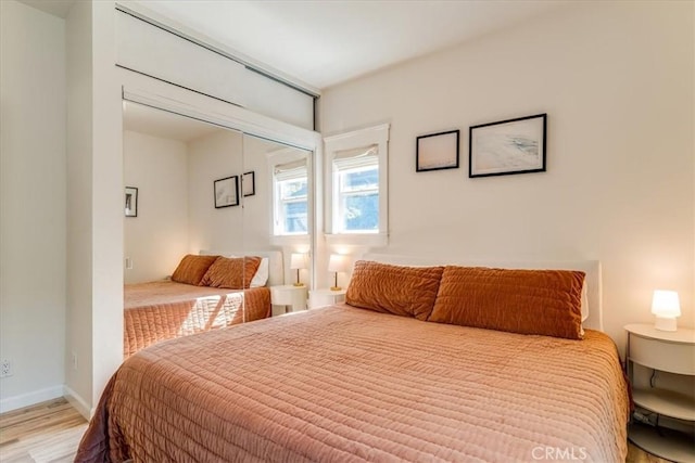 680 Howard St, San Luis Obispo, CA 93401 - bedroom featuring light wood finished floors and baseboards