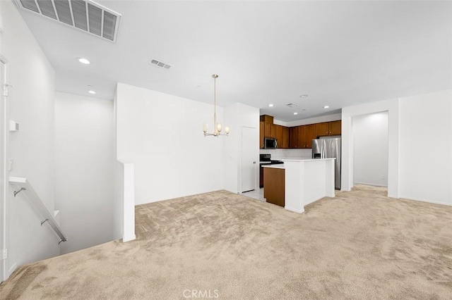 1708 Presidio Pl Unit 1, Chula Vista, CA 91913 - kitchen with appliances with stainless steel finishes, light carpet, a chandelier, recessed lighting, and decorative light fixtures