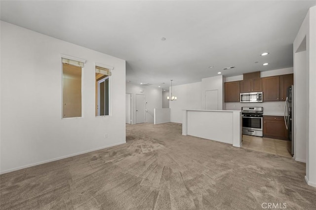 1708 Presidio Pl Unit 1, Chula Vista, CA 91913 - unfurnished living room featuring light colored carpet, recessed lighting, and a chandelier