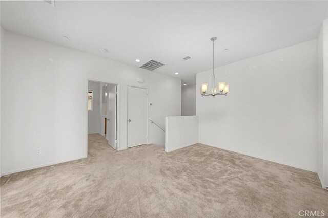 1708 Presidio Pl Unit 1, Chula Vista, CA 91913 - spare room featuring light colored carpet, a chandelier, and recessed lighting