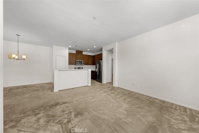1708 Presidio Pl Unit 1, Chula Vista, CA 91913 - unfurnished living room with light carpet, a chandelier, and recessed lighting