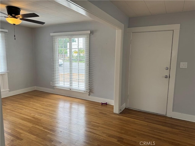 714 E Chapman Ave, Fullerton, CA 92831 - empty room with wood finished floors and ceiling fan