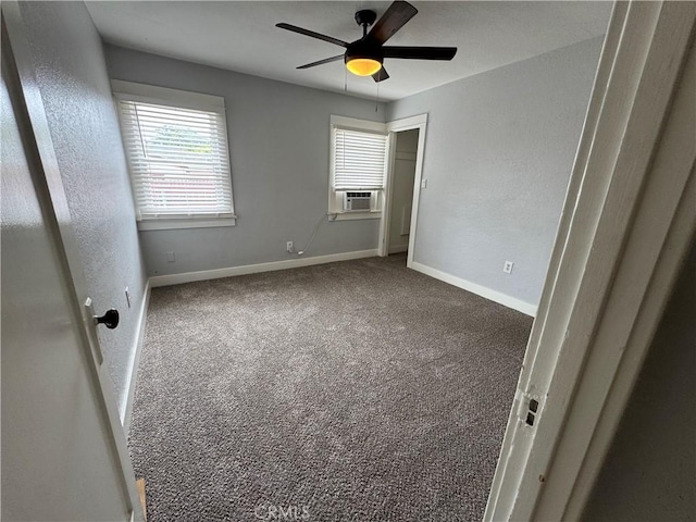 714 E Chapman Ave, Fullerton, CA 92831 - unfurnished bedroom with cooling unit, carpet floors, ceiling fan, and a textured wall