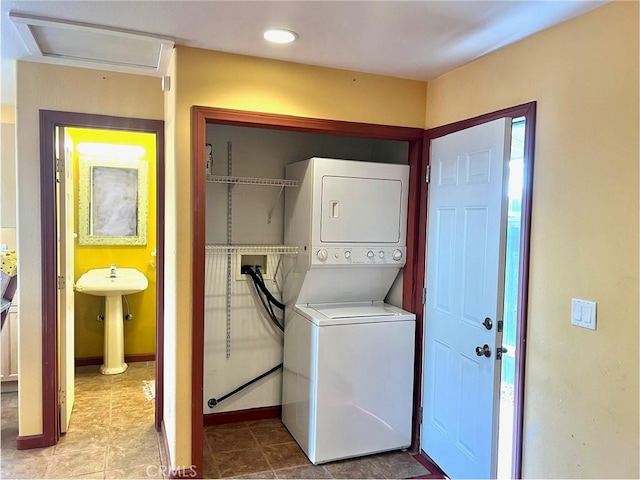 714 E Chapman Ave, Fullerton, CA 92831 - laundry area with estacked washer and dryer, recessed lighting, and tile patterned flooring