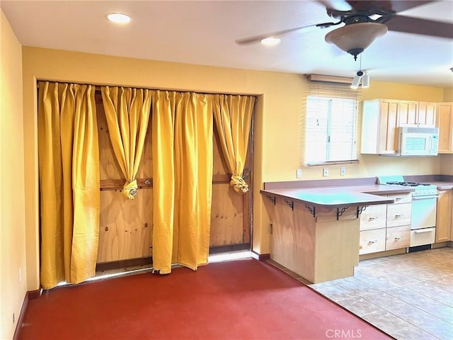 714 E Chapman Ave, Fullerton, CA 92831 - kitchen featuring white appliances, a ceiling fan, recessed lighting, a peninsula, and light countertops