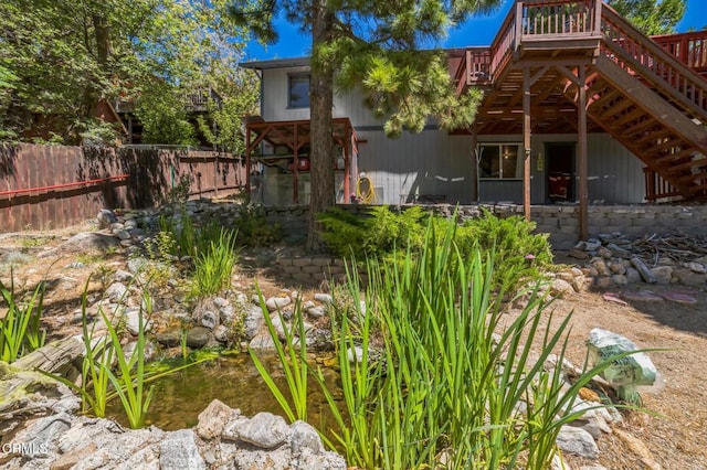 352 Cedarbrook Dr, Twin Peaks, CA 92391 - back of house featuring a deck and stairs
