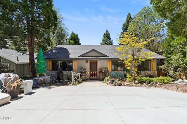 352 Cedarbrook Dr, Twin Peaks, CA 92391 - view of front facade featuring stone siding, a porch, and a shingled roof