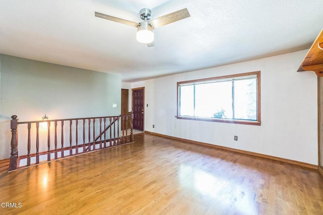 352 Cedarbrook Dr, Twin Peaks, CA 92391 - empty room with wood finished floors and ceiling fan