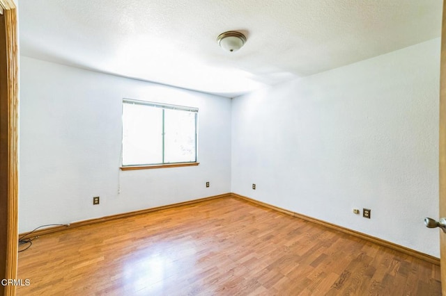 352 Cedarbrook Dr, Twin Peaks, CA 92391 - empty room featuring wood finished floors and baseboards