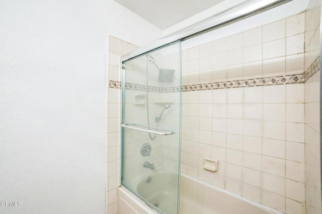 352 Cedarbrook Dr, Twin Peaks, CA 92391 - bathroom featuring combined bath / shower with glass door