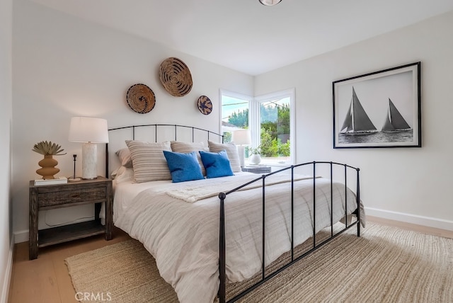 2609 S Leland St, San Pedro, CA 90731 - bedroom featuring baseboards and wood finished floors
