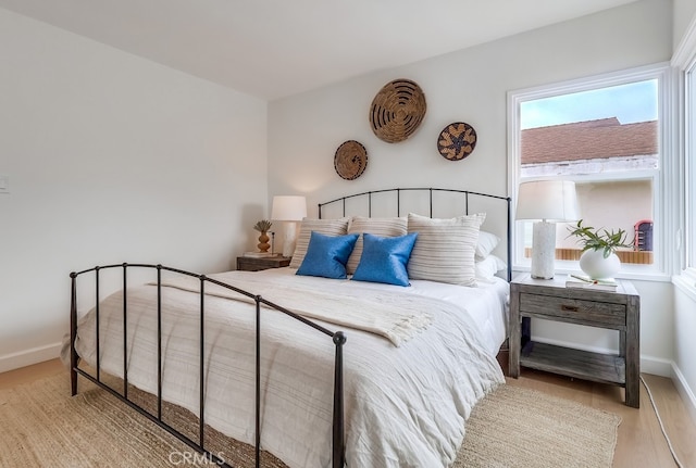 2609 S Leland St, San Pedro, CA 90731 - bedroom with baseboards and wood finished floors