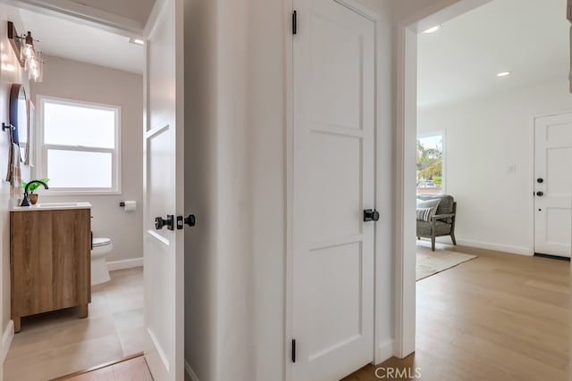 2609 S Leland St, San Pedro, CA 90731 - corridor with recessed lighting and light wood-style floors