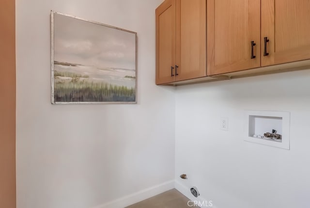 2609 S Leland St, San Pedro, CA 90731 - laundry room featuring cabinet space and washer hookup
