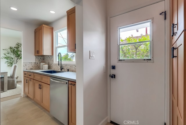 2609 S Leland St, San Pedro, CA 90731 - kitchen featuring stainless steel dishwasher, light countertops, backsplash, light brown cabinetry, and recessed lighting