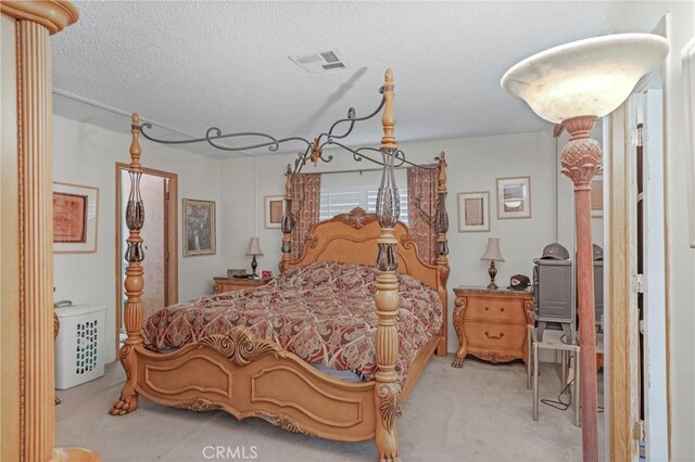 32303 Bilton Way, Wildomar, CA 92595 - bedroom featuring light colored carpet and a textured ceiling