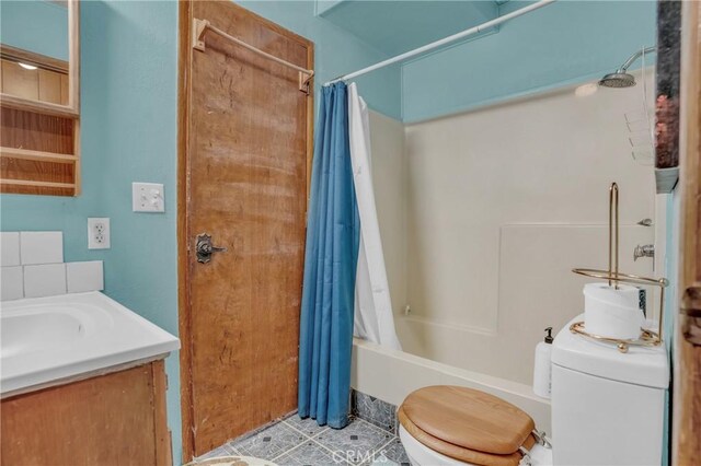 32303 Bilton Way, Wildomar, CA 92595 - bathroom featuring shower / bath combo with shower curtain, vanity, and tile patterned floors