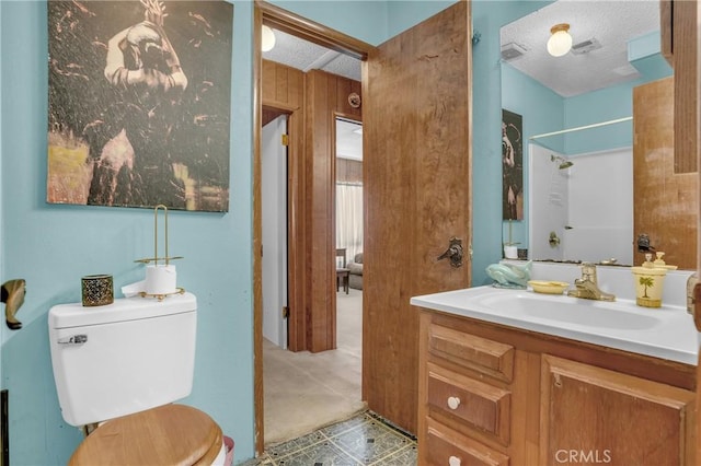 32303 Bilton Way, Wildomar, CA 92595 - bathroom featuring vanity, a shower, and a textured ceiling
