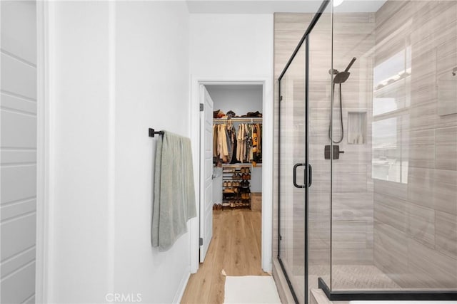 389 Allen Dr, Santa Paula, CA 93060 - full bath featuring a stall shower, a spacious closet, and wood finished floors