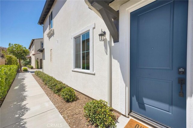 389 Allen Dr, Santa Paula, CA 93060 - doorway to property featuring stucco siding