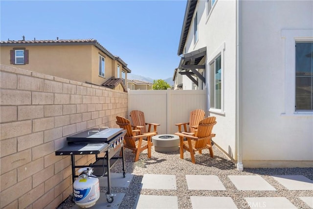 389 Allen Dr, Santa Paula, CA 93060 - fenced backyard featuring a fire pit