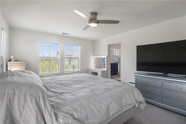 7911 Cold Creek St, Riverside, CA 92507 - carpeted bedroom featuring multiple windows and a ceiling fan