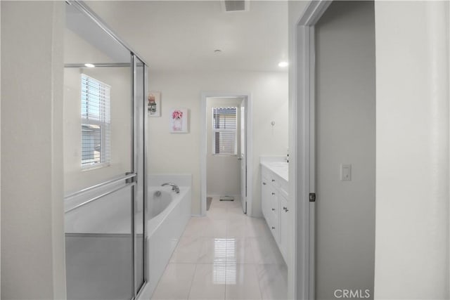 7911 Cold Creek St, Riverside, CA 92507 - full bathroom with vanity, a bath, and a stall shower