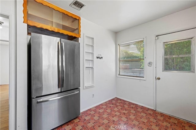 7737 Nestle Ave, Reseda, CA 91335 - kitchen with freestanding refrigerator and baseboards