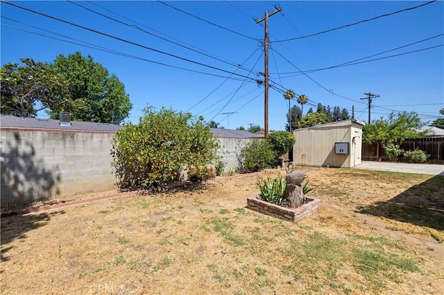 7737 Nestle Ave, Reseda, CA 91335 - fenced backyard with an outdoor structure