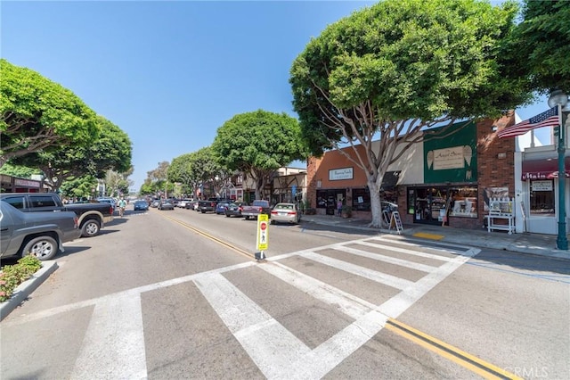 805 Ocean Ave Unit 6, Seal Beach, CA 90740 - view of asphalt road featuring curbs, street lights, and sidewalks