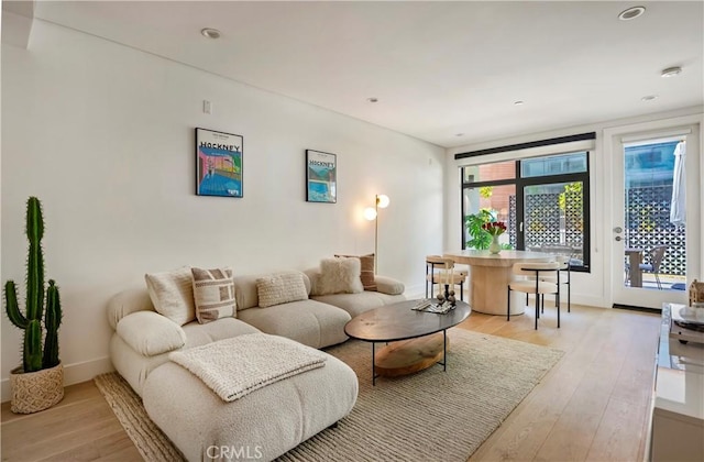 399 E Del Mar Blvd Unit 110, Pasadena, CA 91101 - living room featuring light wood finished floors and recessed lighting
