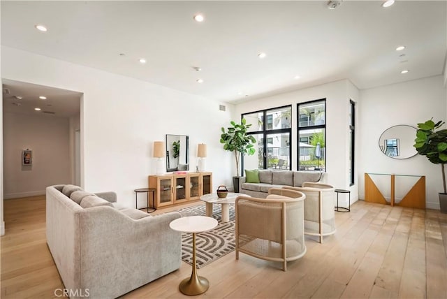 399 E Del Mar Blvd Unit 110, Pasadena, CA 91101 - living room with light wood-style flooring and recessed lighting