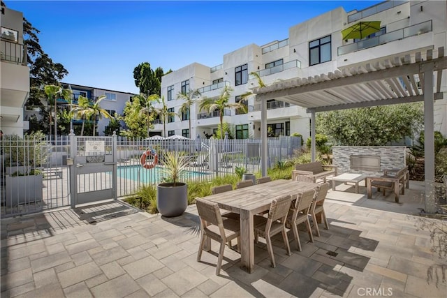 399 E Del Mar Blvd Unit 110, Pasadena, CA 91101 - view of patio featuring a pergola, outdoor dining space, a residential view, and a community pool