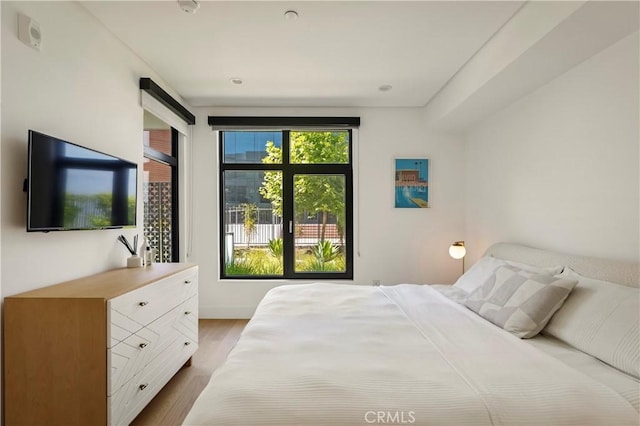 399 E Del Mar Blvd Unit 110, Pasadena, CA 91101 - bedroom with wood finished floors