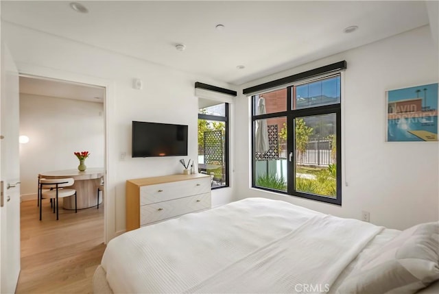 399 E Del Mar Blvd Unit 110, Pasadena, CA 91101 - bedroom featuring light wood-style floors