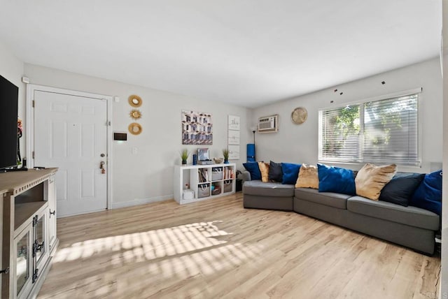 1280 W Main St Unit 42, El Cajon, CA 92020 - living room featuring light wood finished floors and a wall mounted AC