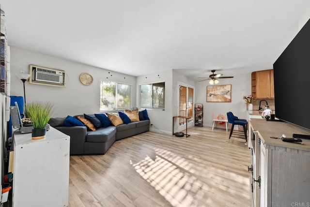 1280 W Main St Unit 42, El Cajon, CA 92020 - living area with ceiling fan, light wood-style floors, and a wall mounted air conditioner