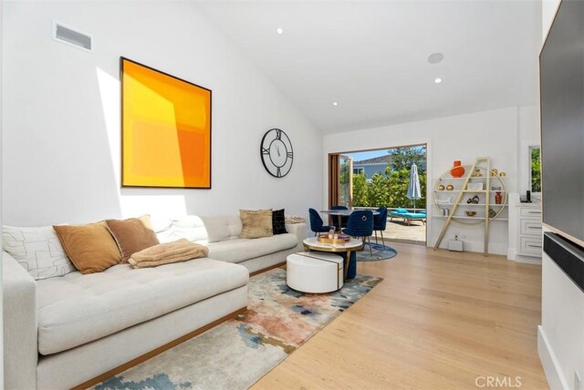 1954 Port Locksleigh Pl, Newport Beach, CA 92660 - living area featuring light wood-style flooring, lofted ceiling, and recessed lighting