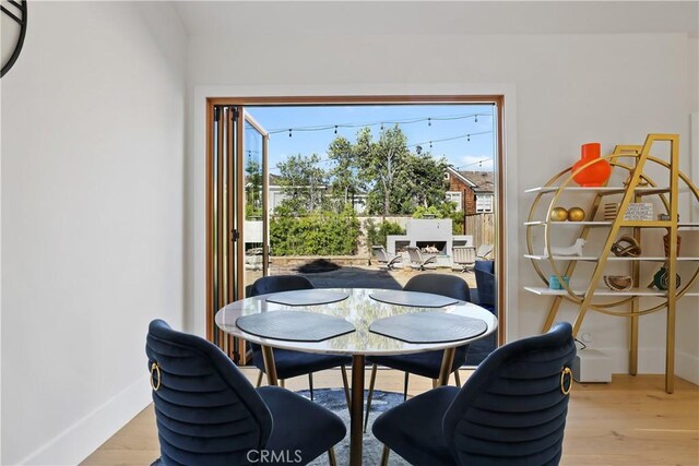 1954 Port Locksleigh Pl, Newport Beach, CA 92660 - dining space featuring light wood finished floors